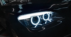 BMW 7 F01 — тюнинг фар: авторские светодиодные ангельские глазки, квадробилед (светодиодные линзы GNX A3+ by Aozoom и GTR Mini Bi-LED), покраска в черный глянец, замена стекол