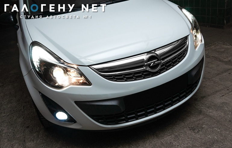Opel Corsa D — замена штатных галогенных линз на биксеноновые модули Hella 3R, замена ламп в ПТФ, в поворотниках, полировка стекол фар