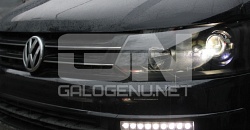 Volkswagen Caravelle 2010 Установка биксеноновых модулей Hella, штатного омывателя фар, а также декорирование фары черным матовым цветом